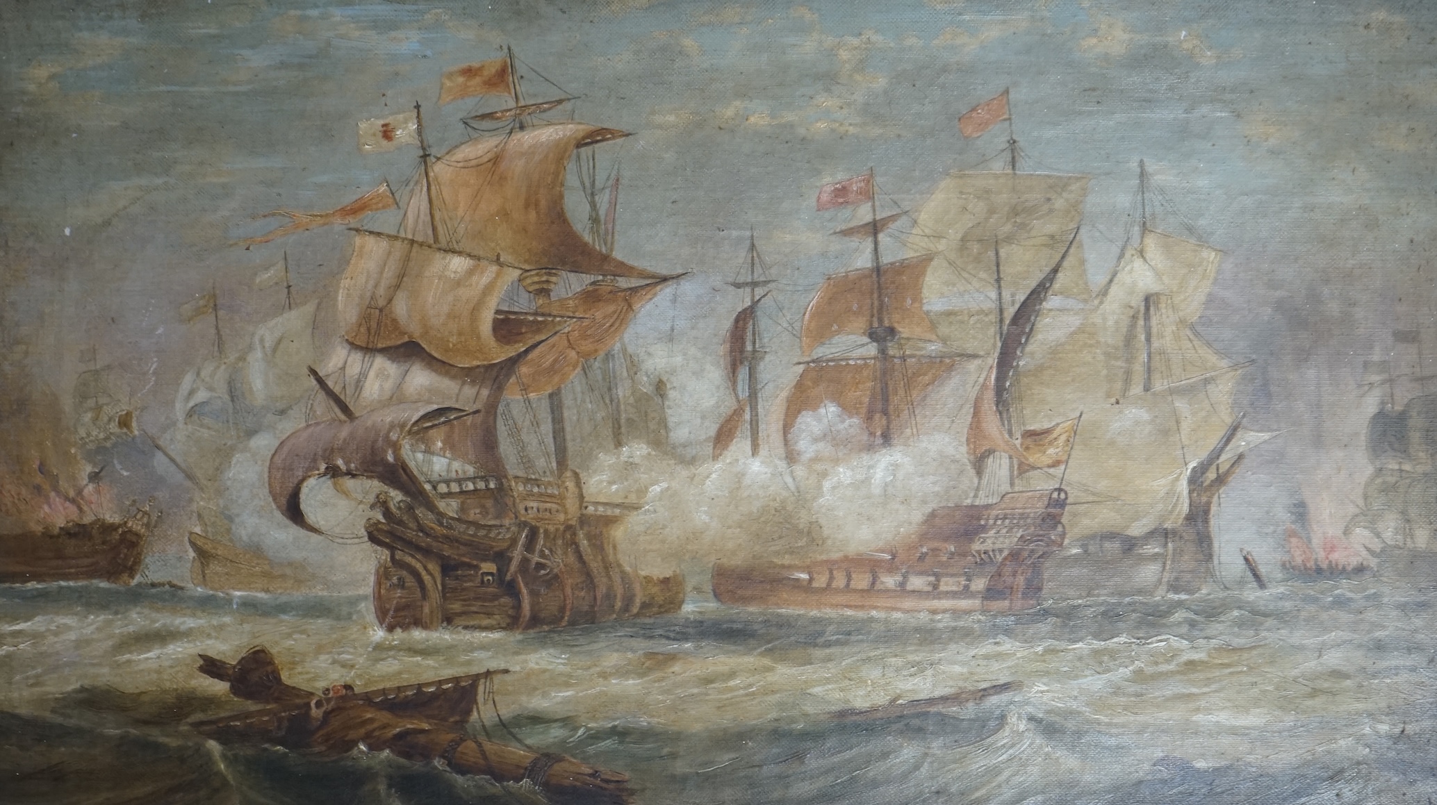 19th century English School, oil on canvas, ‘Battle of Trafalgar’, 28 x 49.5cm, housed in a carved wood frame. Condition - poor to fair, would benefit from a clean